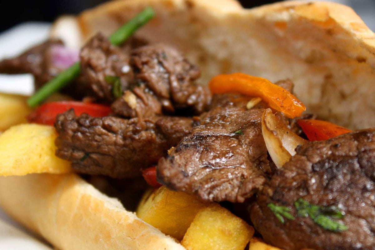 peruvian sandwich with lomo saltado