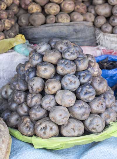 purple potatoes in peru marketplace