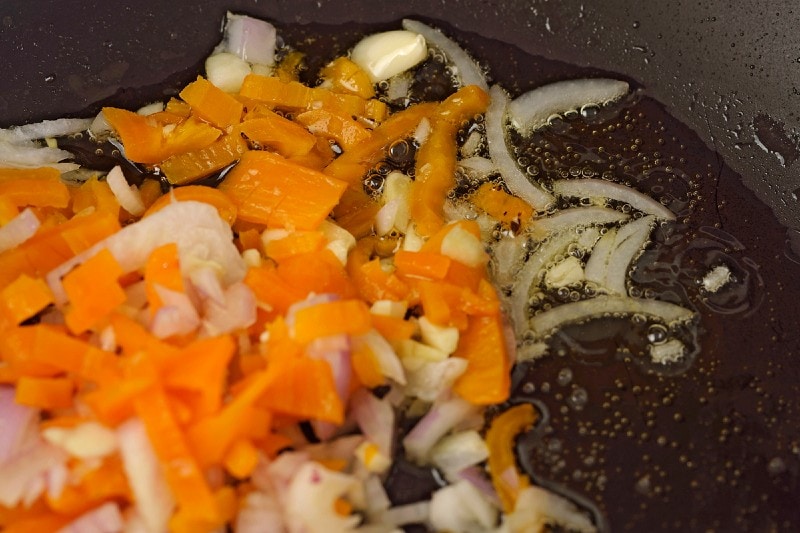 ají pepper chopped onion garlic and pecans