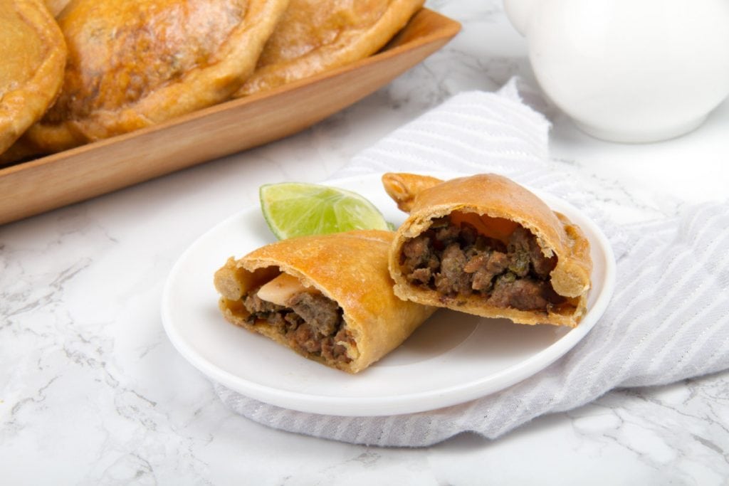 close up of baked beef empanada