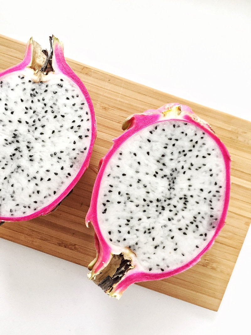 pitaya chopped in half with seeds