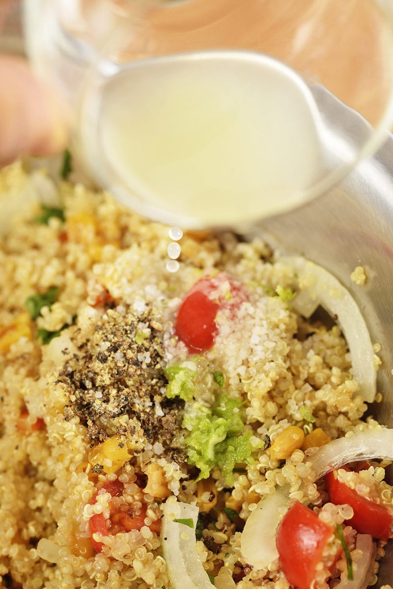 onions, limes, quinoa, olive oil, lime juice in bowl