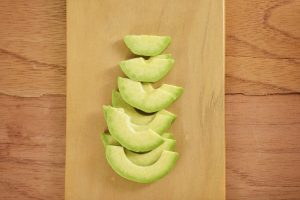 remove avocado flesh and cut into thin slices