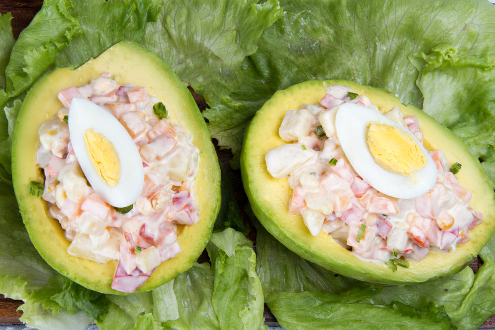 stuffed avocados with egg on lettuce
