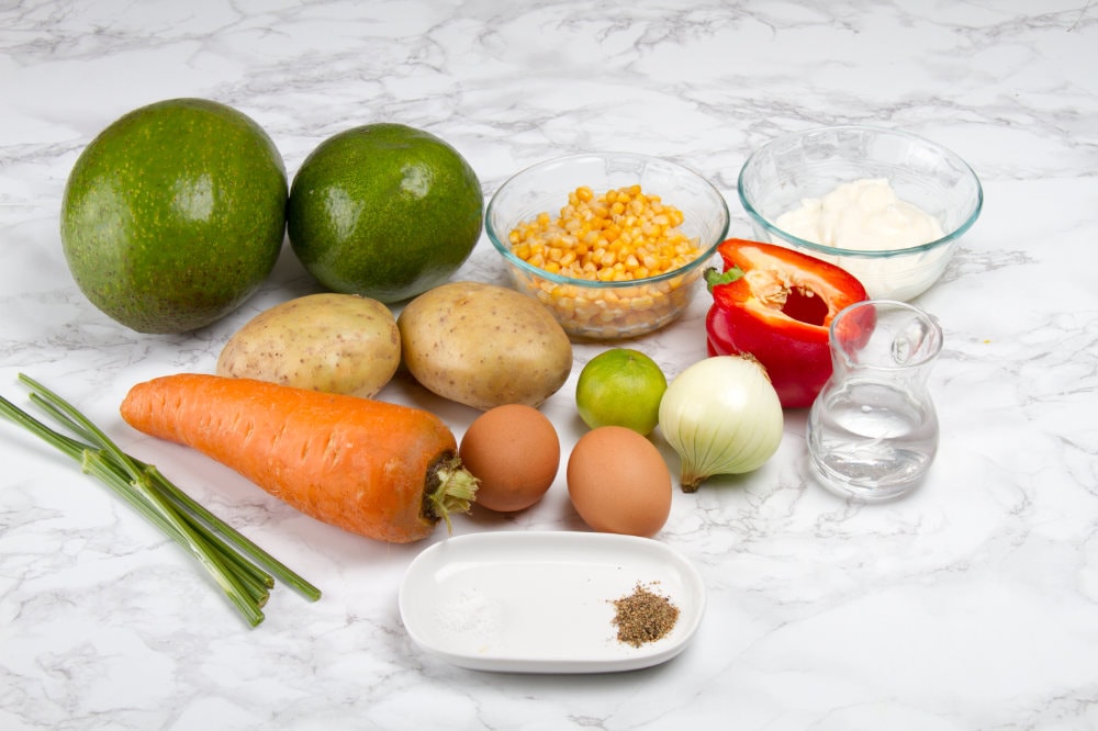 vegetarian stuffed avocado ingredients on table top