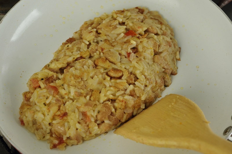 individual fried beans and rice serving