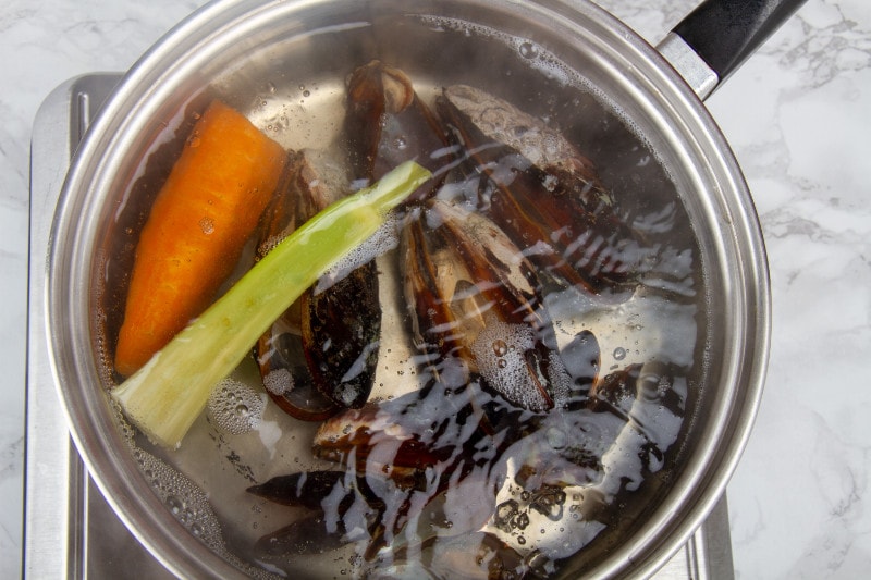 boiling mussels and vegetables