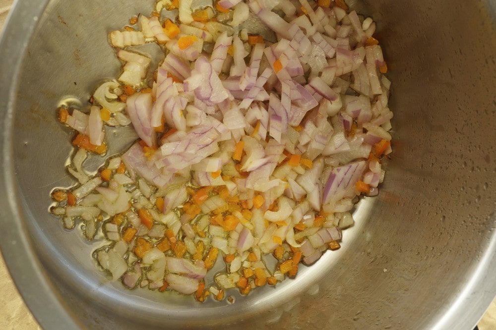 step 1 add oil garlic aji onion to pot