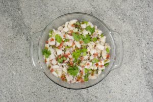 Fish Ceviche With Tomatoes Cucumber Onion And Cilantro