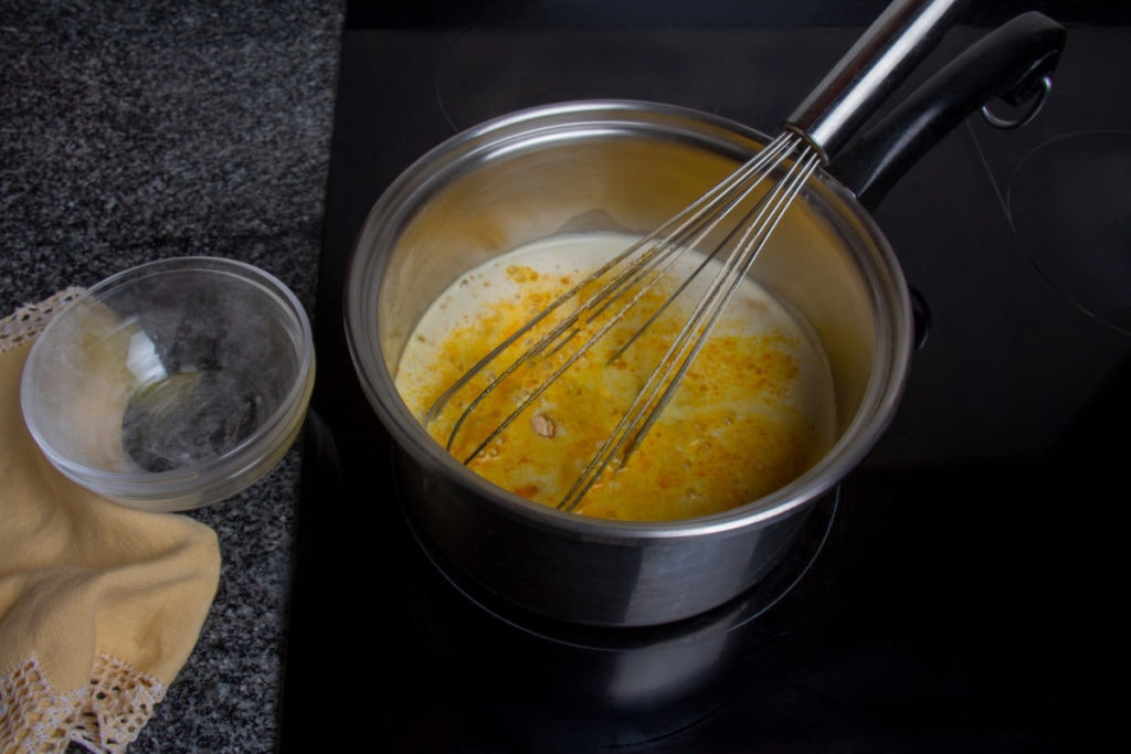 step 2 add egg yolks and caramel flan to pan