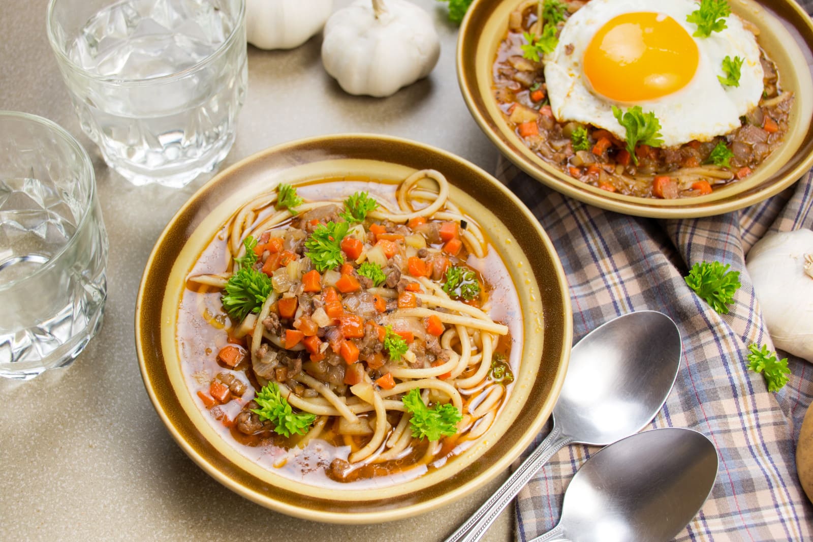 bowl of peruvian beef and noodle soup