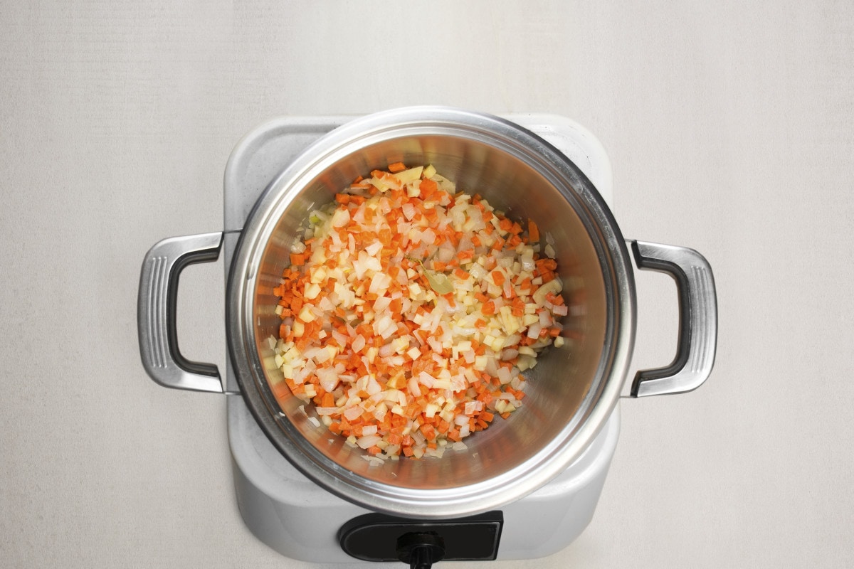 step 4 add potatoes and carrots to sauteed onions