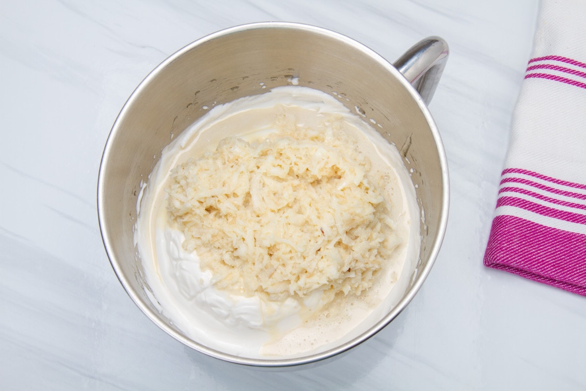 mix coconut mix with condensed milk in bowl