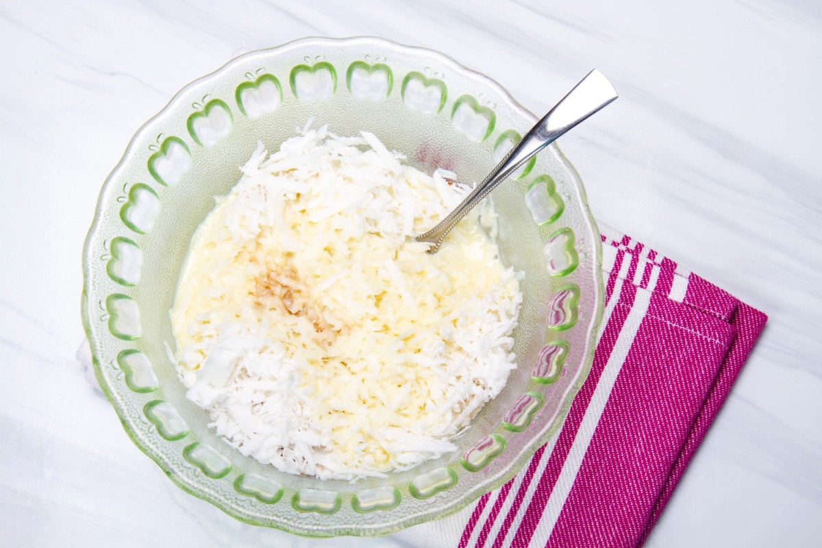 mix grated coconut condensed milk and vanilla essence