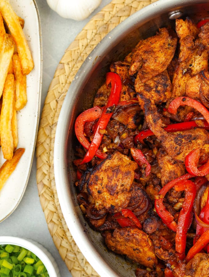 peruvian chicken stir fry plate with fries