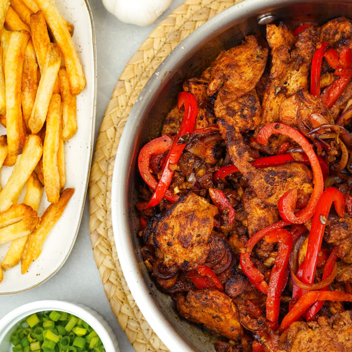 peruvian chicken stir fry plate with fries