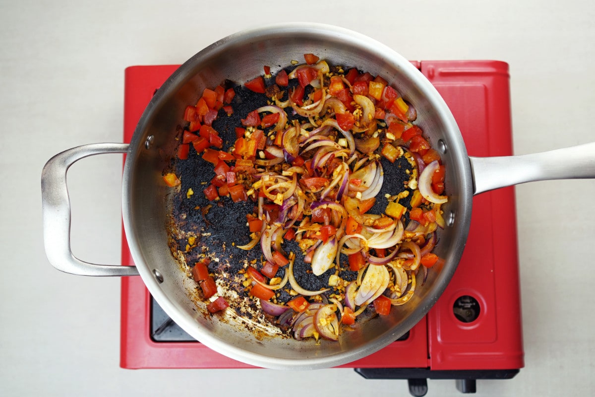 step 5 add tomato onion garlic