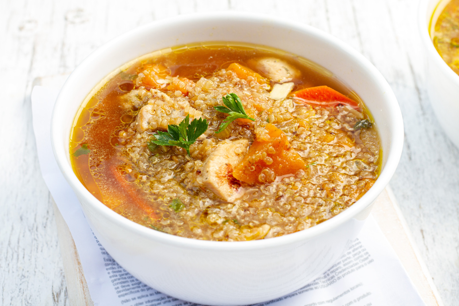 delicious bowl of hot quinoa and chicken soup