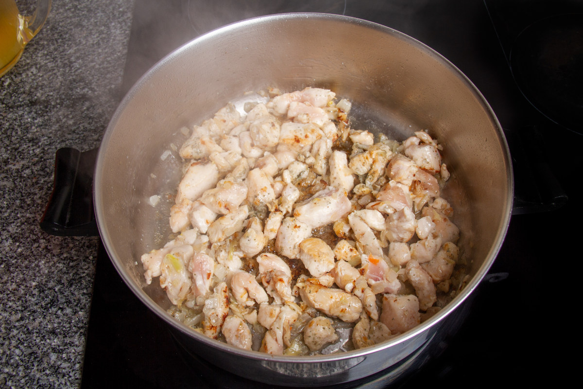 step 6 add cubed boneless chicken breasts to pot