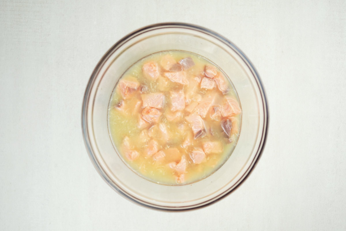 step 1 cut the salmon into cubes and marinate it