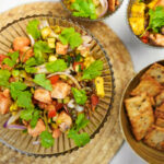 salmon ceviche with vegetables and crackers