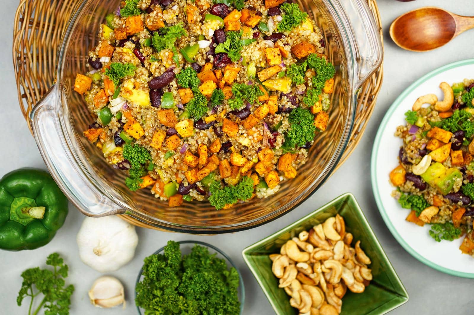 Colorful quinoa salad with vegetables and cashews.