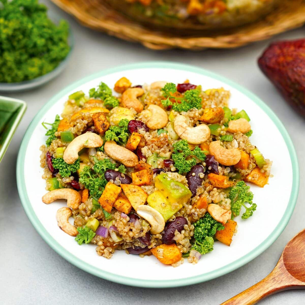 Colorful quinoa salad with vegetables and cashews