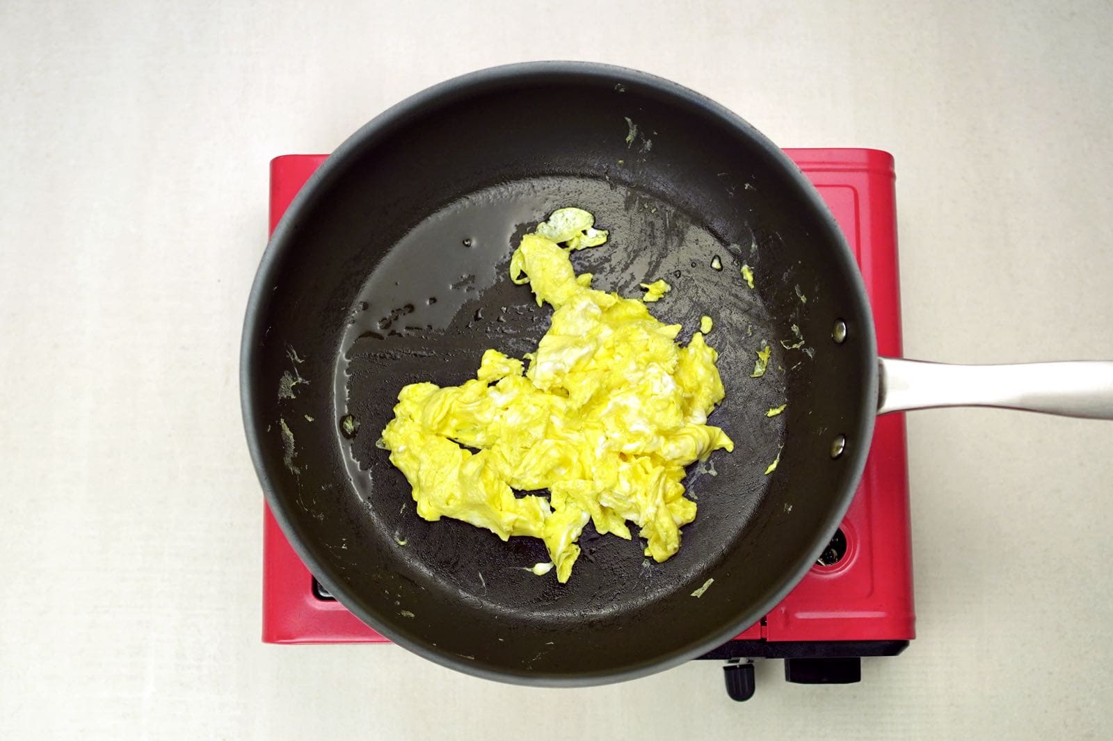 Step 2: Scrambled eggs cooking in a pan